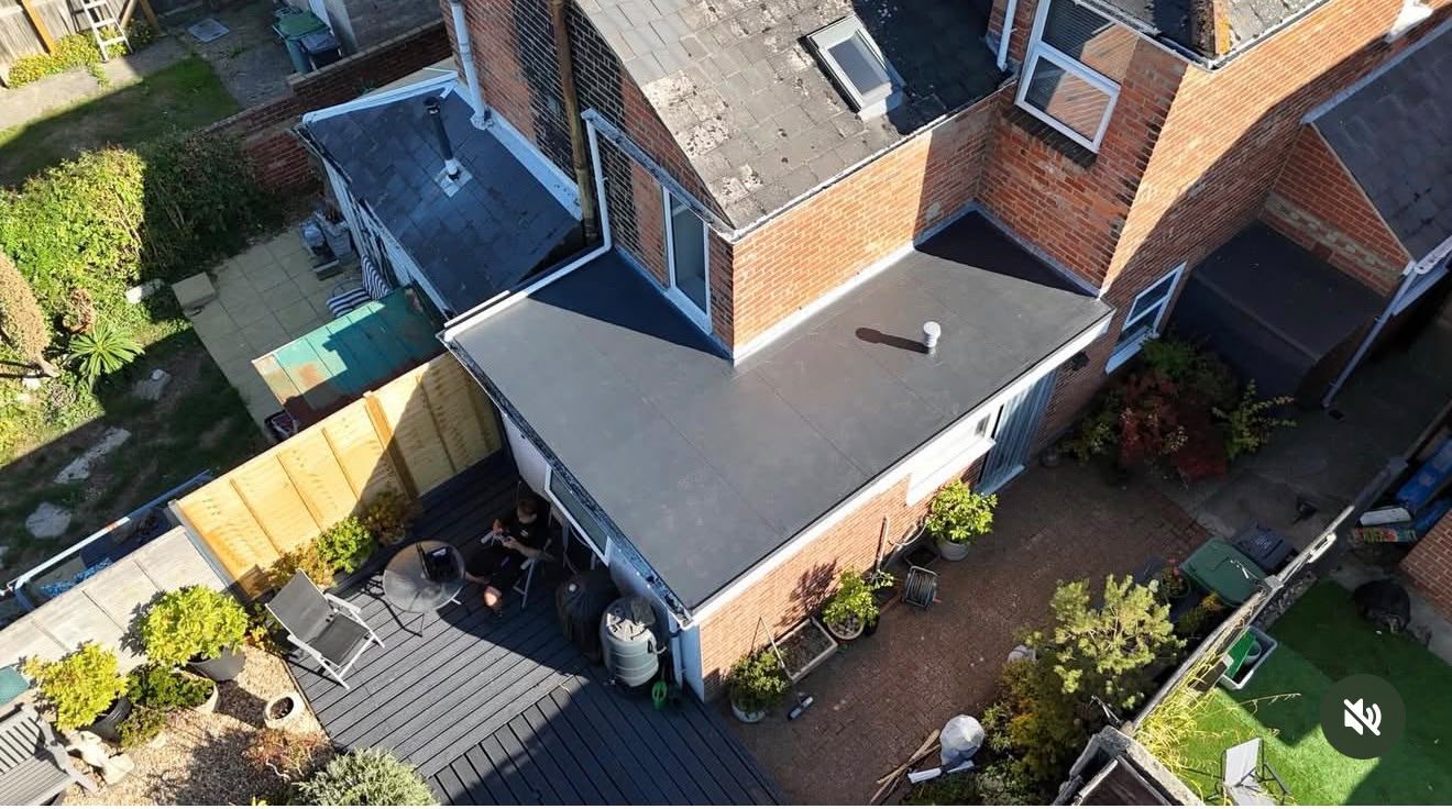 Aerial view of a domestic rear extension flat roof over a garden in Kent